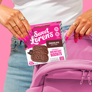Sweet Loren's Chocolate Breakfast Biscuits being packed into a pink backpack