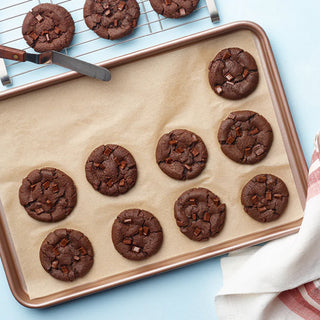 Baked Sweet Loren's Fudgy Brownie cookies on a baking sheet